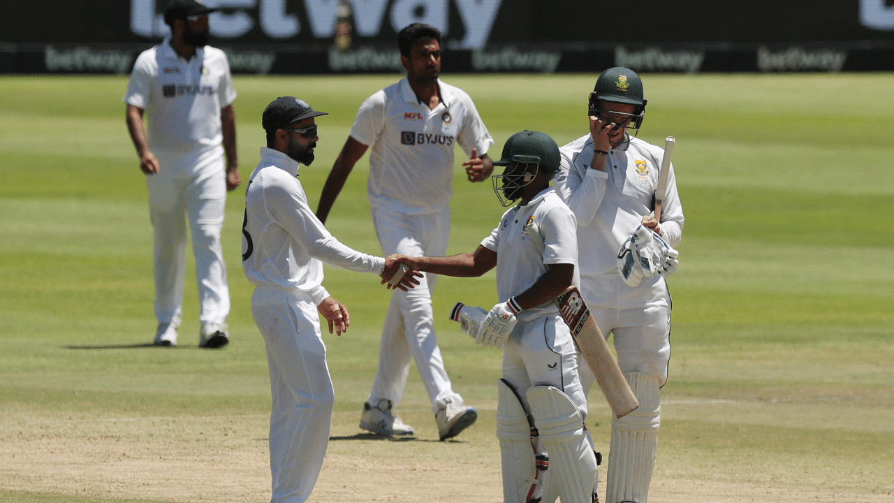 India's Virat Kohli shakes hands with South Africa's Temba Bavuma after the match. Credit: Reuters Photo