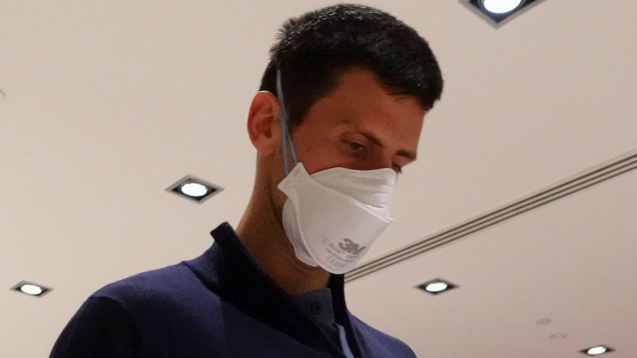 Serbian tennis player Novak Djokovic walks in Melbourne Airport before boarding a flight. Credit: Reuters Photo