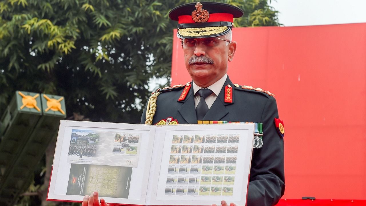 Army Chief General Manoj Mukund Naravane releases commemorative postage stamps during the Army Day Parade, at KM Cariappa Parade Ground, in New Delhi, Saturday, January 15, 2022. Credit: PTI Photo