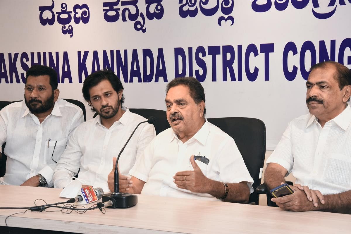 Former Minister B Ramanath Rai addresses a press conference in Mangaluru.