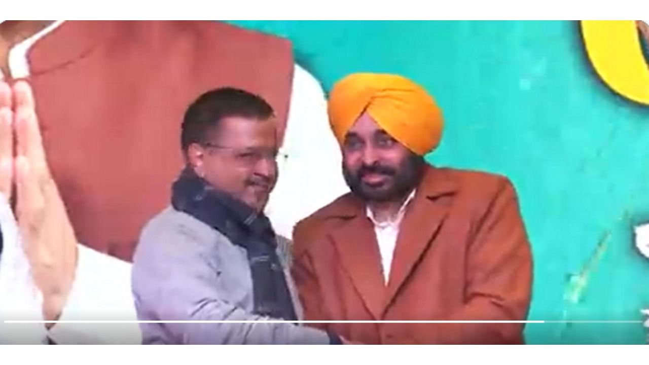 Arvind Kejriwal and Bhagwant Mann. Credit: Screengrab of video on Twitter/@AamAadmiParty