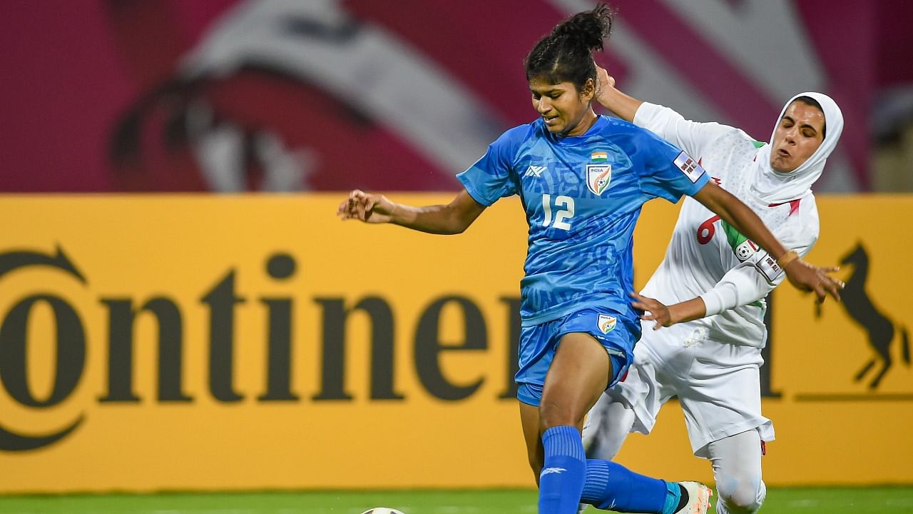 India's Indumathi Kathiresan in action against Iran in Asian Cup opener. Credit: PTI Photo