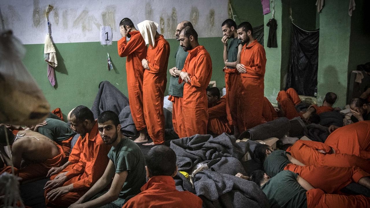 The Kurdish authorities have long warned they did not have the capacity to hold, let alone put on trial, the thousands of IS fighters captured in years of operations. Credit: AFP File Photo