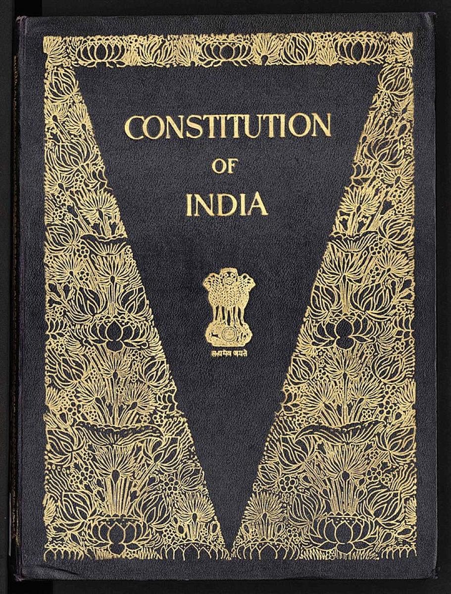 The Constitution's pages are bound together in black leather, with beautiful gold patterns.