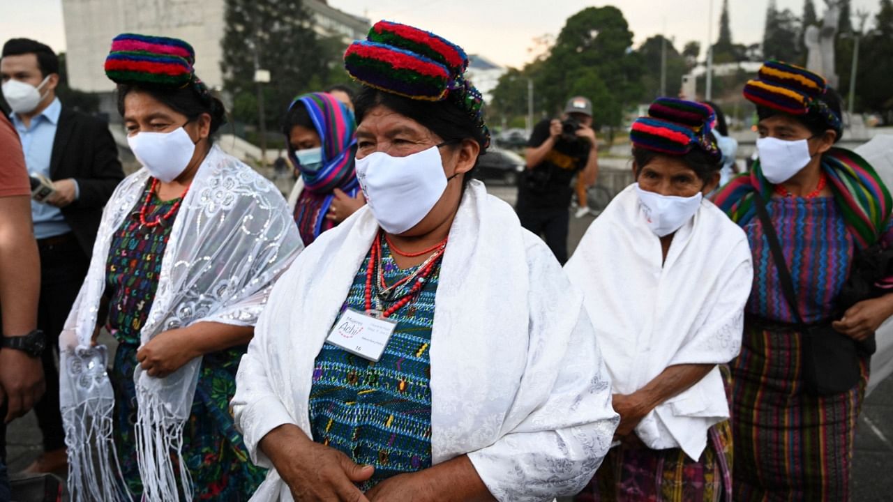 Guatemalan Achi women, victims of sexual violence during the internal armed conflict (1960-1996), react at the end of the trial against five former Guatemalan Civil Patrol (PAC) members, outside the Justice Palace in Guatemala. Credit: Reuters Photo