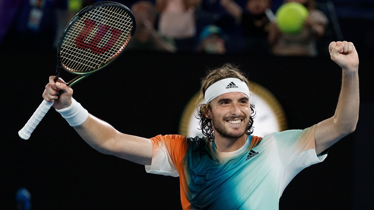 Stefanos Tsitsipas of Greece celebrates after defeating Jannik Sinner of Italy in their quarterfinal match at the Australian Open tennis championships in Melbourne. Credit: AP/PTI Photo