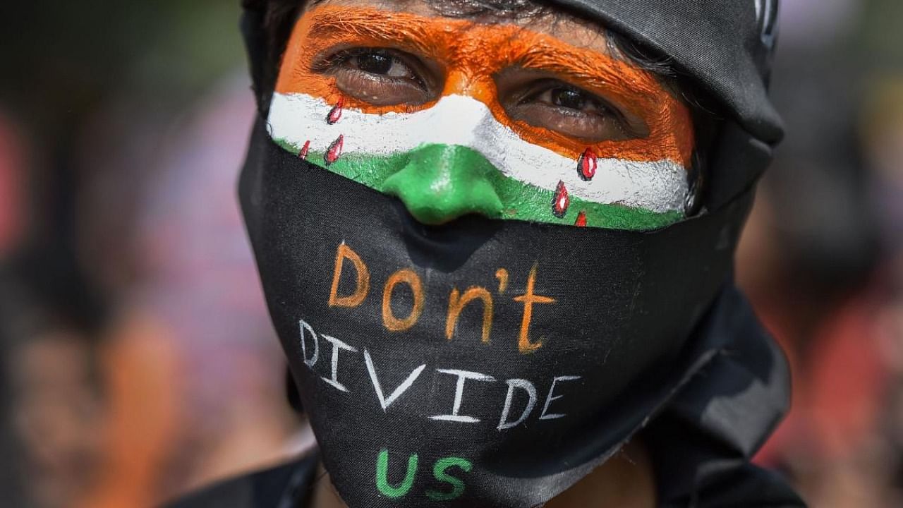 A protestor participates in a demonstration 'Delhi Chalo' against Citizenship (Amendment) Act (CAA) , National Register of Citizens (NRC) and National Population Register (NPR) at Jantar Mantar in New Delhi. Credit: PTI file photo