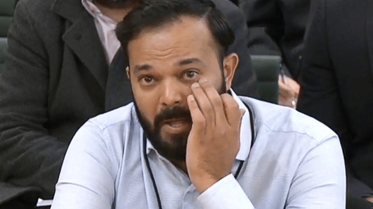 A video grab from footage broadcast by the UK Parliament's Parliamentary Recording Unit (PRU) shows former Yorkshire cricketer Azeem Rafiq fighting back tears while testifying in front of a Digital, Culture, Media and Sport (DCMS) Committee in London. Credit: AFP Photo