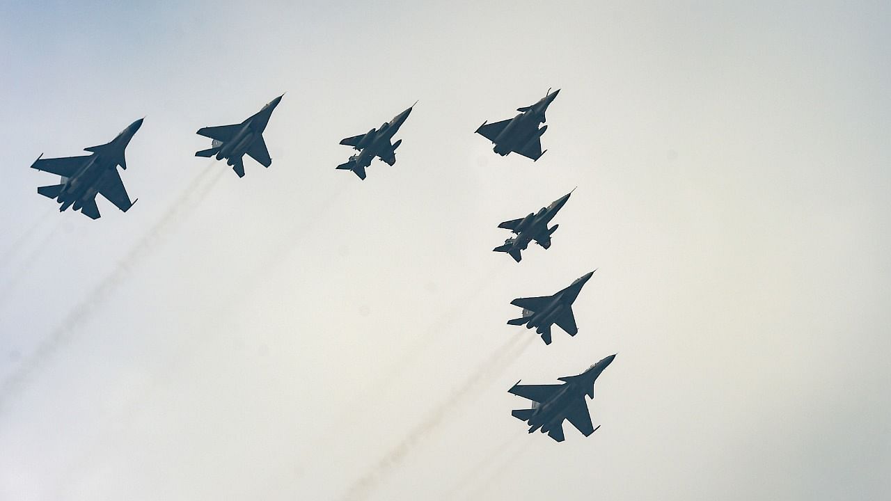 Aircrafts display the 'seven-arrowhead' formation during the January 26 parade in New Delhi. Credit: PTI Photo