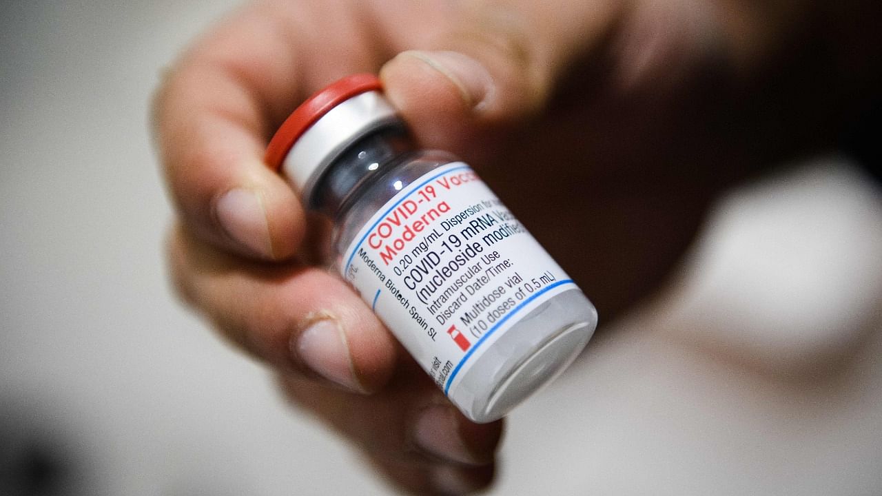 A nurse holds a vial of Moderna's Covid-19 vaccine. Credit: AFP File Photo