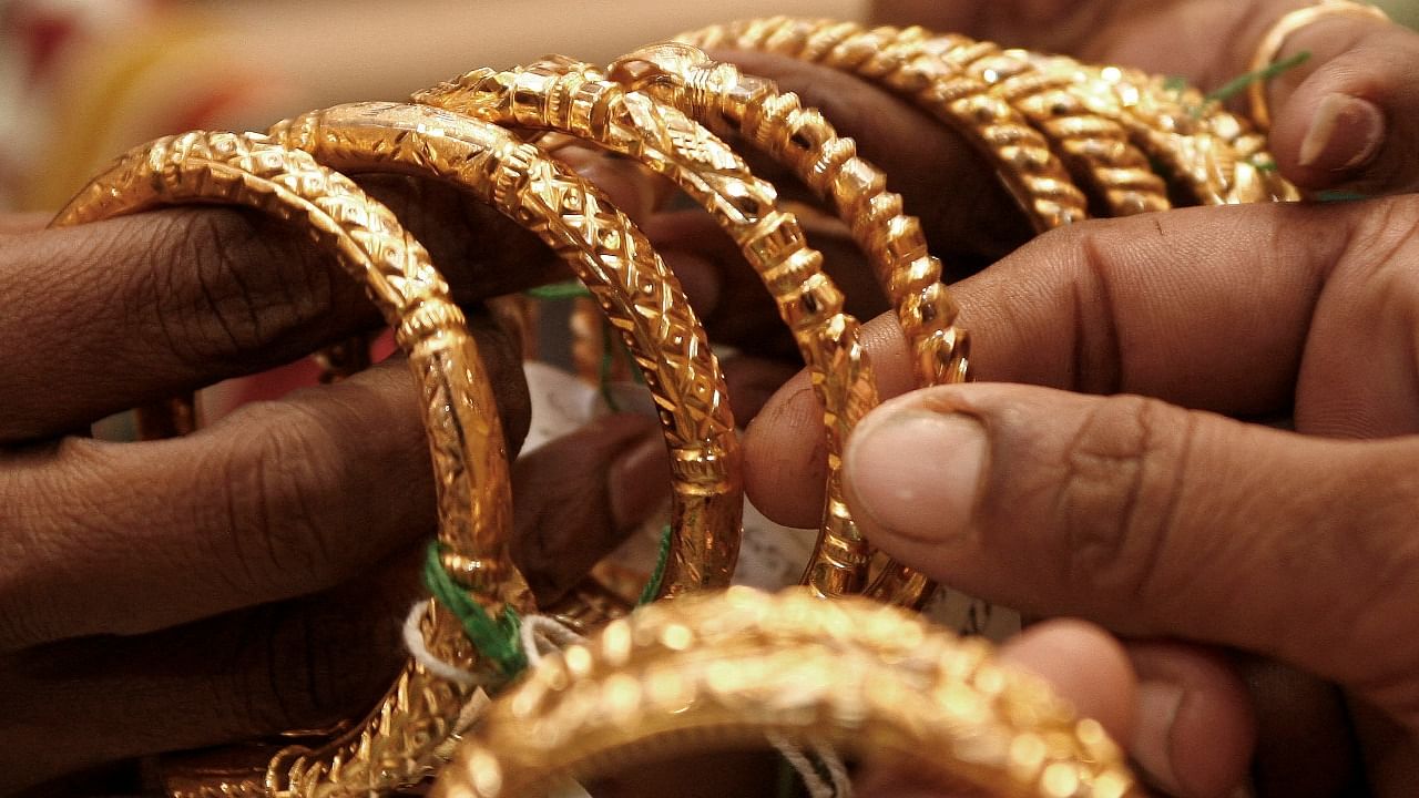 Local gold prices were trading around Rs 48,000 per 10 grams this week after hitting a record high of Rs 56,191 in August 2020. Credit: Reuters Photo
