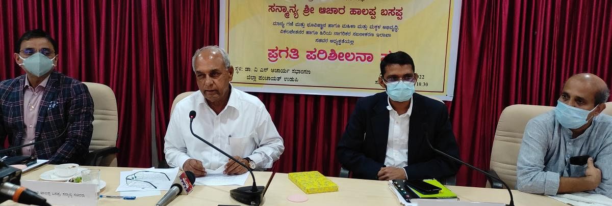 Minister for Mines and Geology, Women and Child Development Halappa Basappa Achar addresses officials after presiding over a review meeting of Mines and Geology, Women and Child Welfare and Department for Empowerment of Differently Abled and Senior Citize