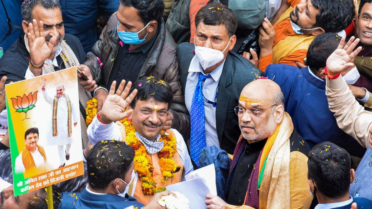 Home Minister Amit Shah during a door to door campaign ahead of the UP Assembly election, in Muzaffarnagar. Credit: PTI Photo