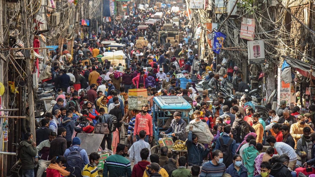A crowded view of Sadar Bazar after some ease in the weekend curfew by the Delhi Government, in New Delhi. Credit: PTI Photo