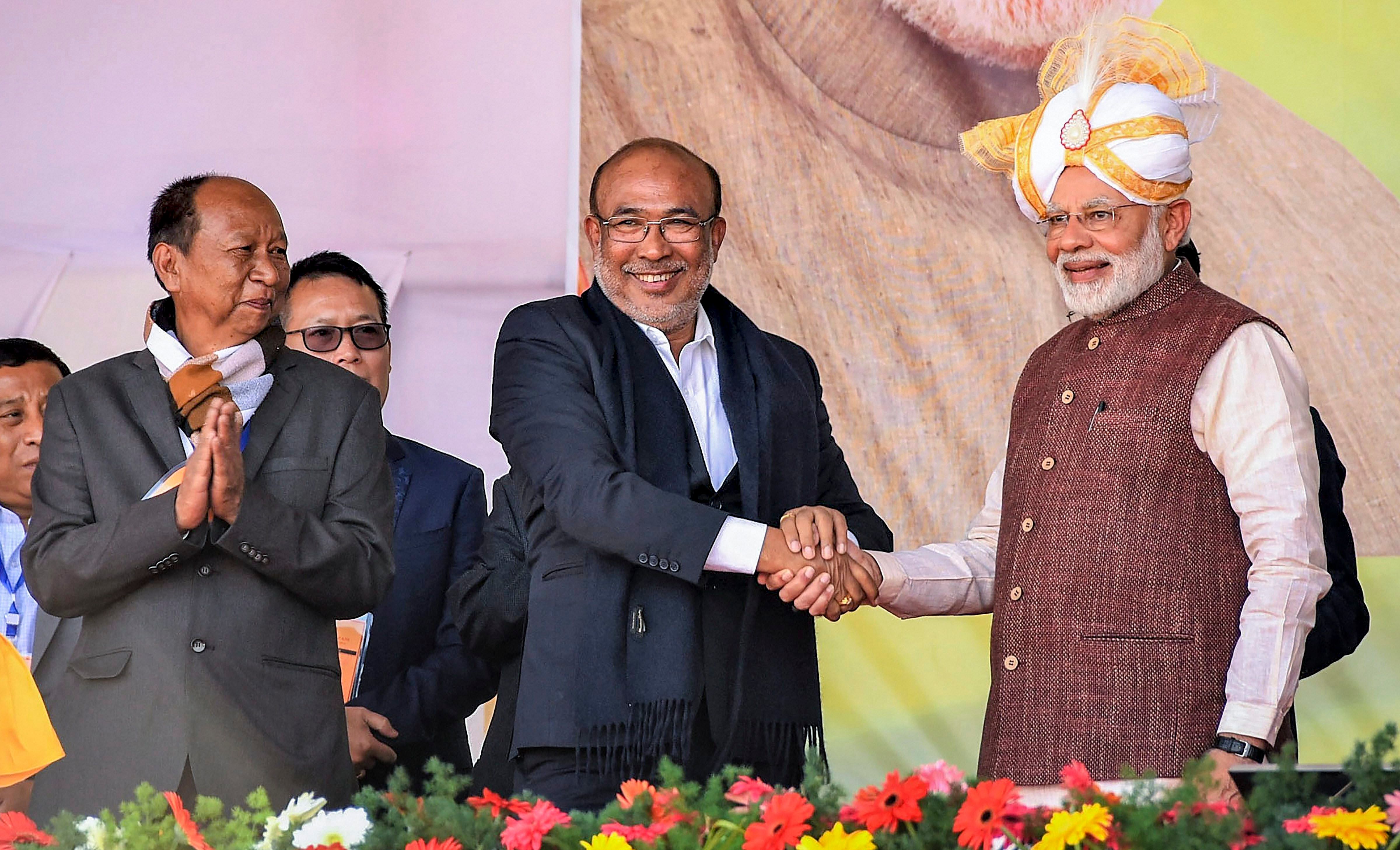 Prime Minister Narendra Modi greets Manipur Chief Minister N Biren Singh. Credit: PTI File Photo