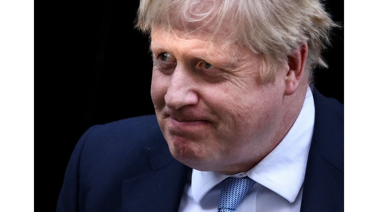 British Prime Minister Boris Johnson walks outside 10 Downing Street in London, Britain, January 31, 2022. Credit: Reuters Photo