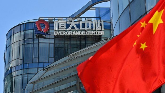 Evergrande is now reeling under more than $300 billion in debt, struggling to revive sales and repay creditors and suppliers. Credit: AFP Photo
