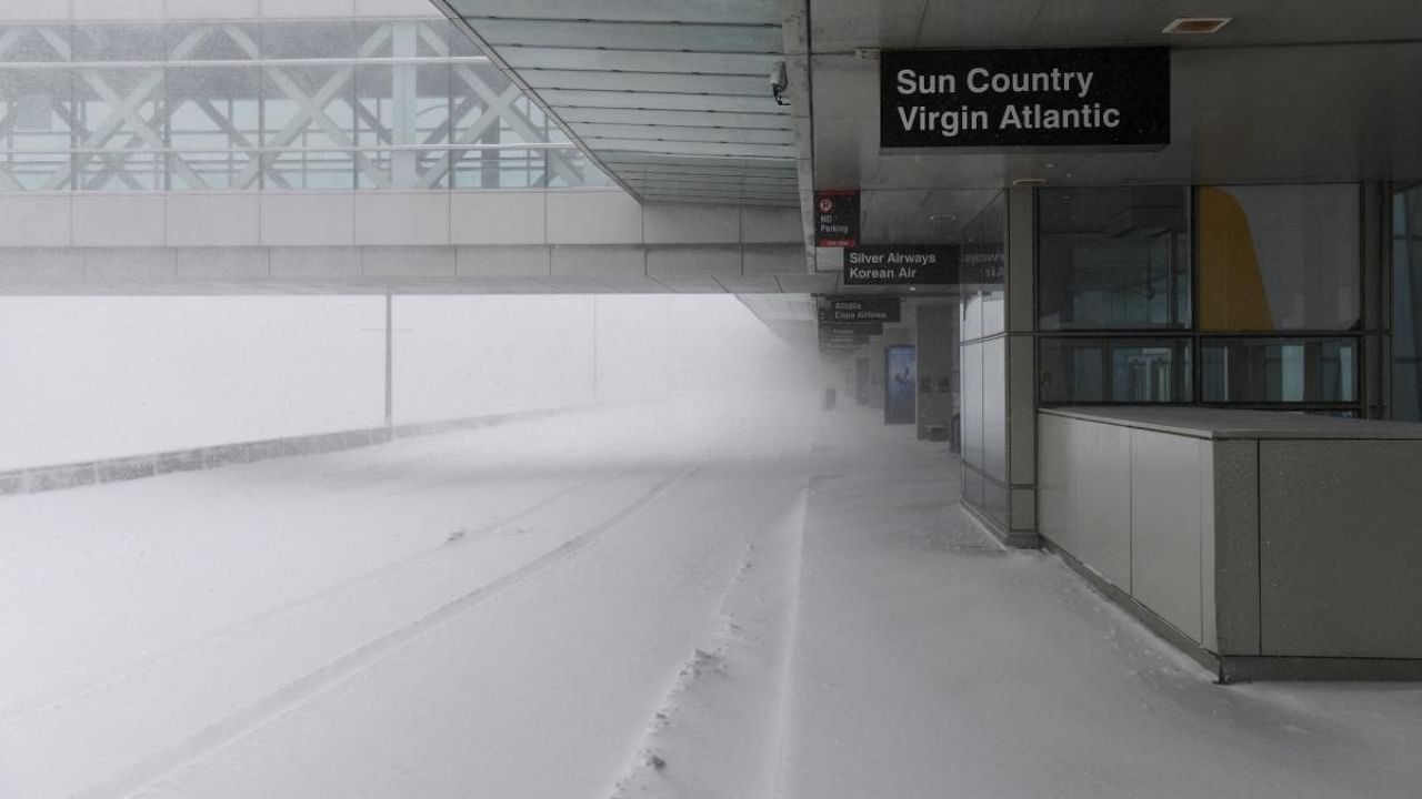 Terminal E at Boston Logan International Airport stands mostly empty during a powerful Nor'easter storm in Boston, Massachusetts. Credit: Reuters photo