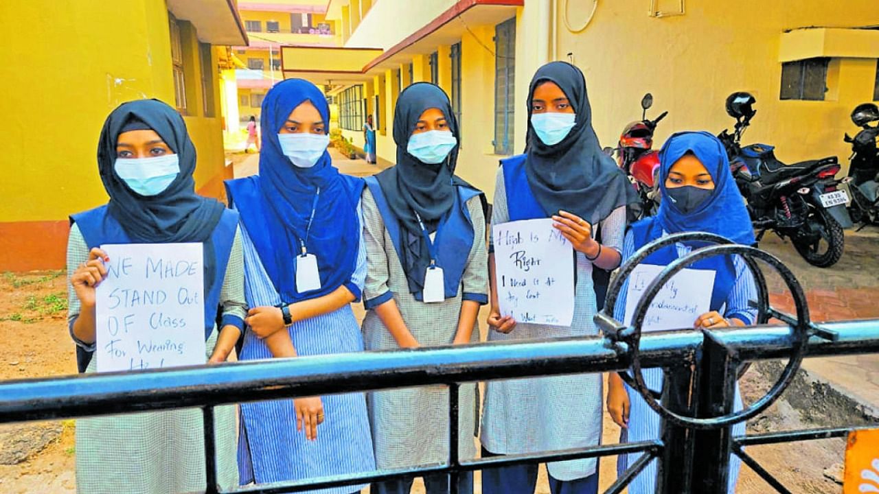The five Muslim girl students who have been prevented from attending classes with their 'hijab' during a protest in Udupi. Credit: DH File Photo