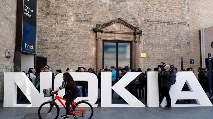 Nokia also proposed a dividend, suspended since 2019, of 8 euro cents per share for 2021, and start a share buyback scheme of 600 million euros. Credit: Reuters File Photo