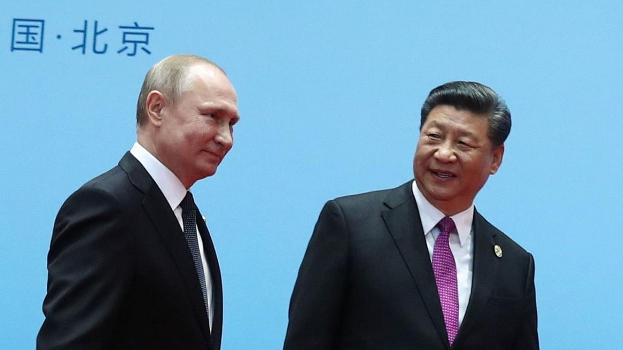 China's President Xi Jinping (R) and Russia's President Vladimir Putin. Credit: AFP Photo