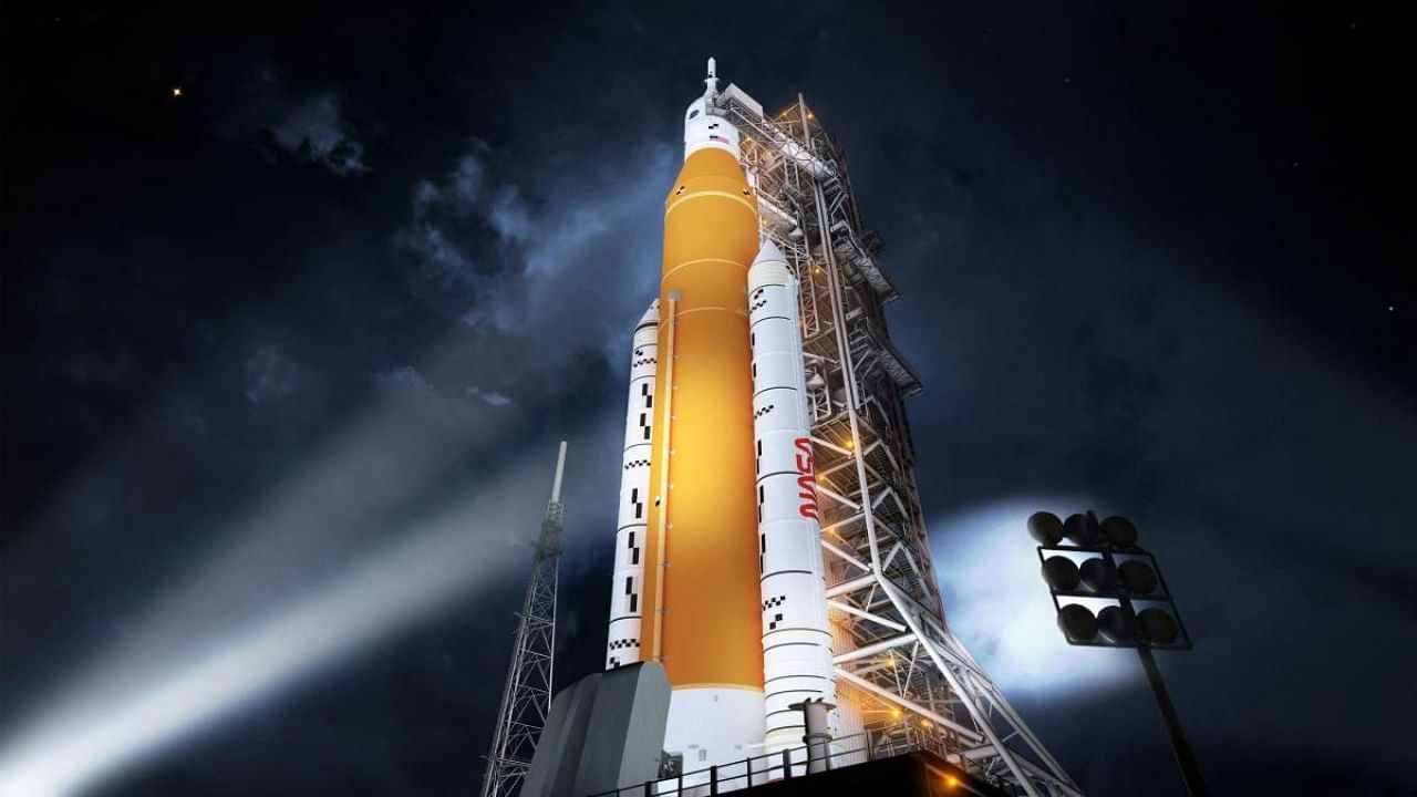 In this file photo taken on August 19, 2014 this handout illustration courtesy of NASA released on October 22, 2020 shows Nasa's new rocket, the Space Launch System (SLS), in its Block 1 crew vehicle configuration that will send astronauts to the Moon on the Artemis missions. Credit: AFP Photo/NASA/MSFC