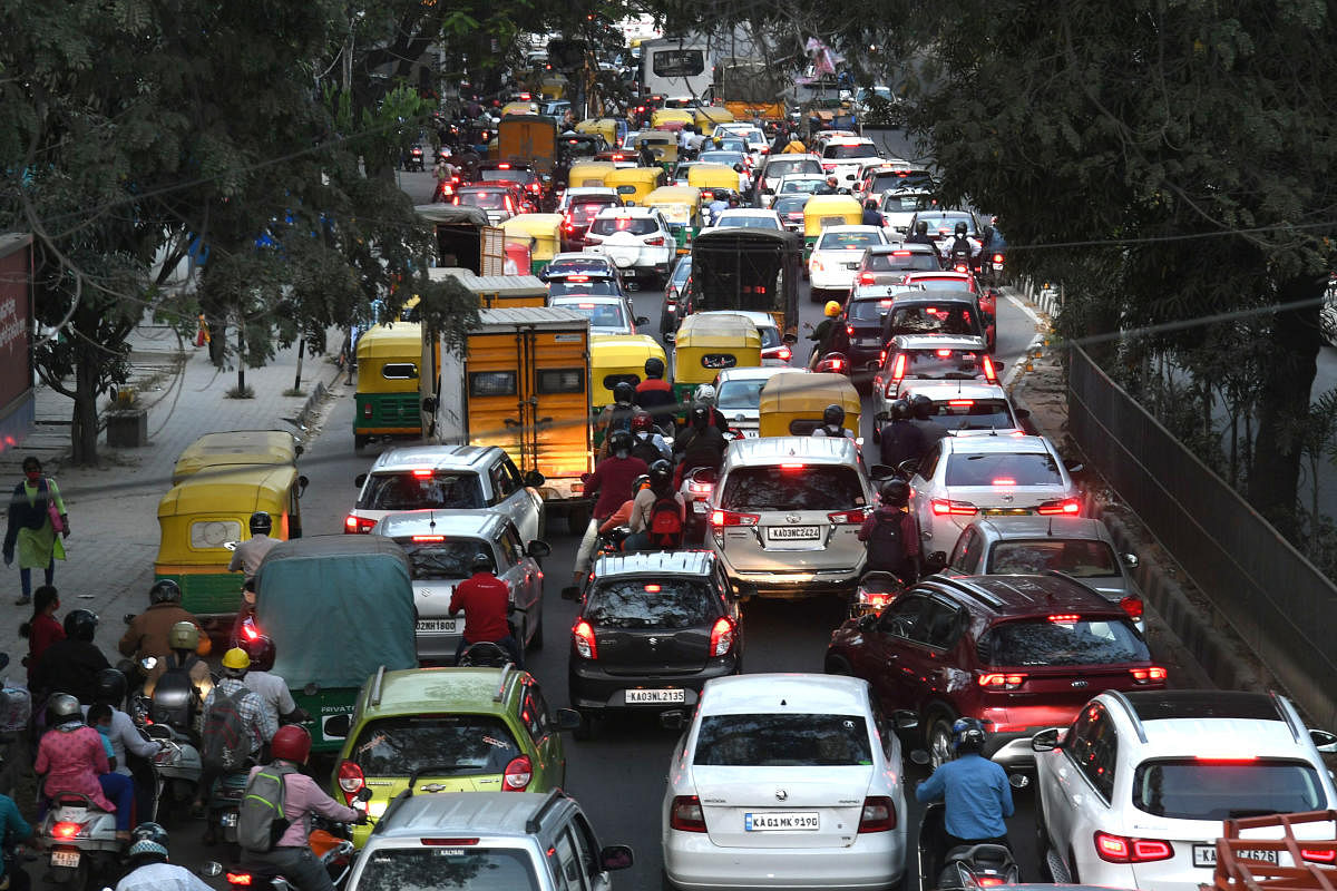 With 10 million vehicles, and many switching to private vehicles because of the pandemic, Bengaluru is affected badly by air pollution. DH Photo by S K Dinesh