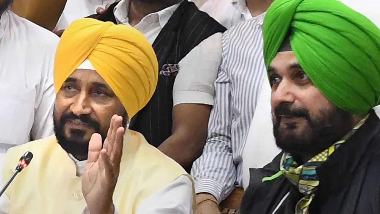 Punjab Chief Minister Charanjit Singh Channi and PPCC President Navjot Singh Sidhu. Credit: PTI File Photo