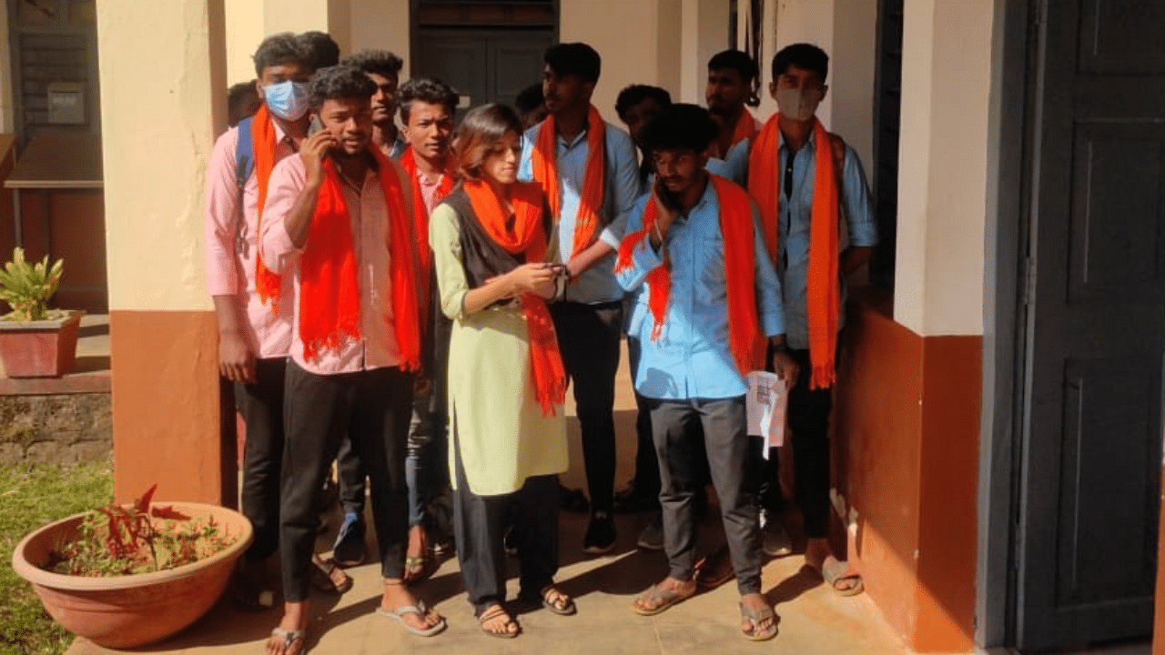 Students wearing saffron shawls took out a procession till Shastri Circle in Kundapura to protest the sudden holiday. Credit: IANS Photo/Representative image