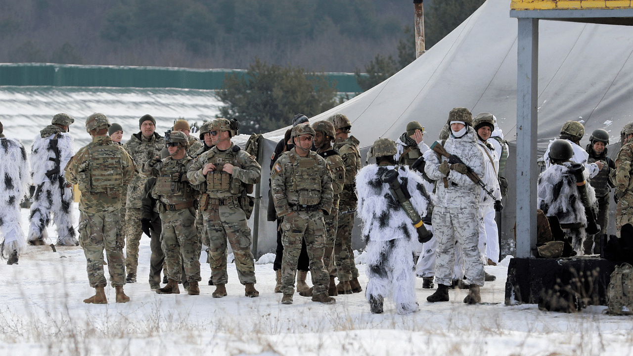 Ukrainian service members and US army instructors take part in drills at the International Peacekeeping Security Centre near Yavoriv in the Lviv region, Ukraine. Credit: Reuters Photo