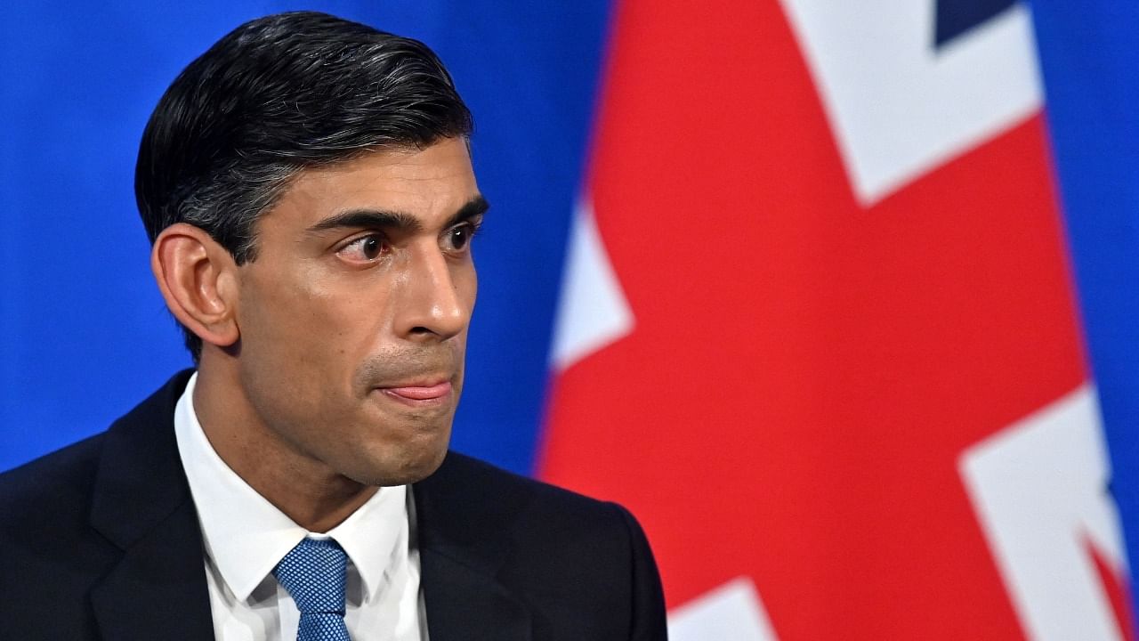 Britain's Chancellor of the Exchequer Rishi Sunak hosts a press conference in the Downing Street Briefing Room on February 3, 2022. Credit: AFP Photo