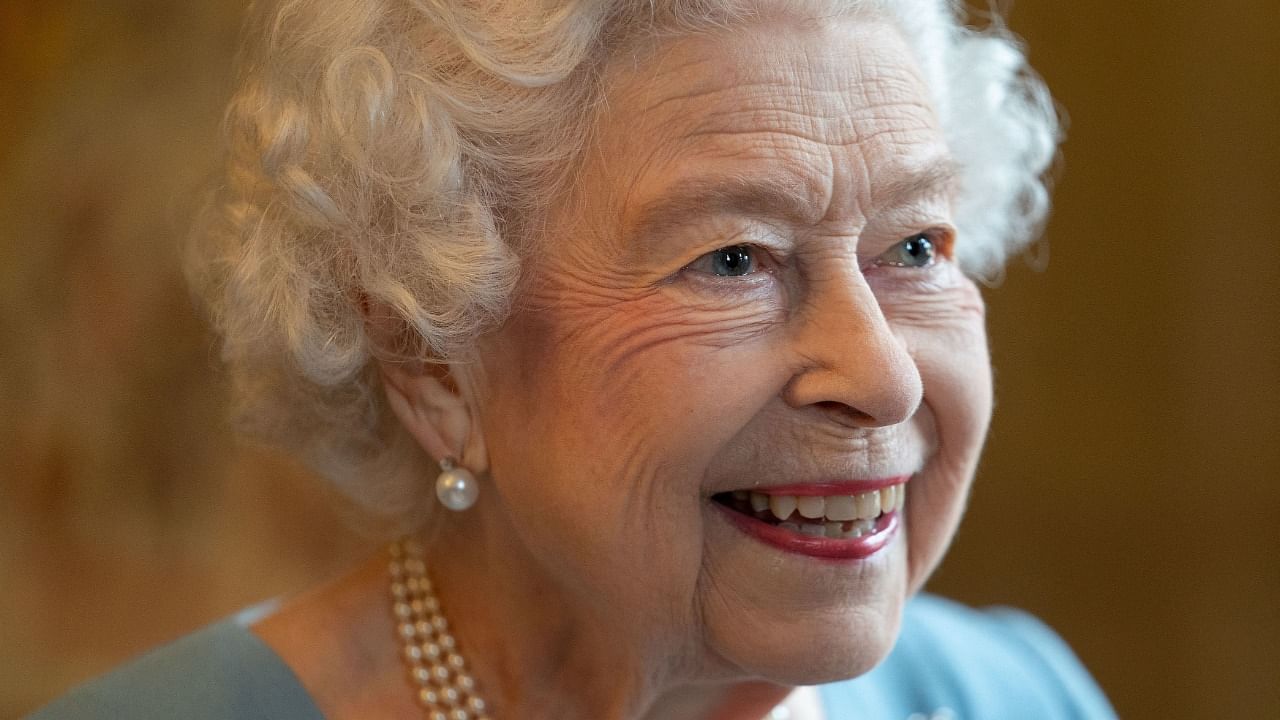 Queen Elizabeth II on Sunday became the first British monarch to reign for seven decades, in a bittersweet landmark as she also marked the 70th anniversary of her father's death. Credit: AFP File Photo