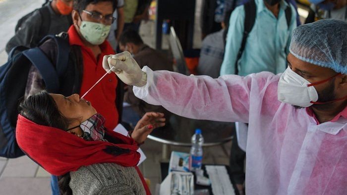 Some 45% of Sunday’s new cases (3,822) were in Bengaluru Urban. But the crux of the outbreak, which migrated to other districts two weeks ago, shows signs of receding even from there. Credit: AFP Photo