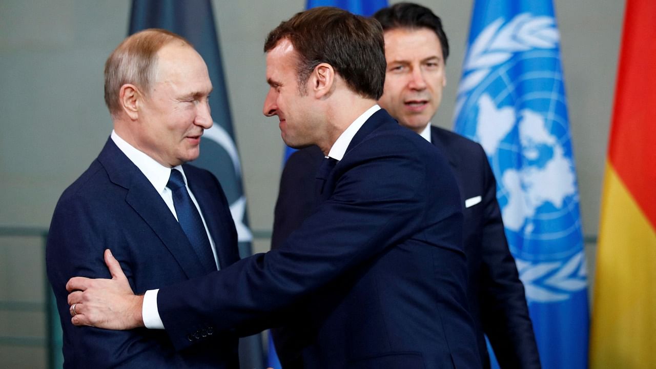 Russian President Vladimir Putin (L) with French President Emmanuel Macron. Credit: Reuters File Photo