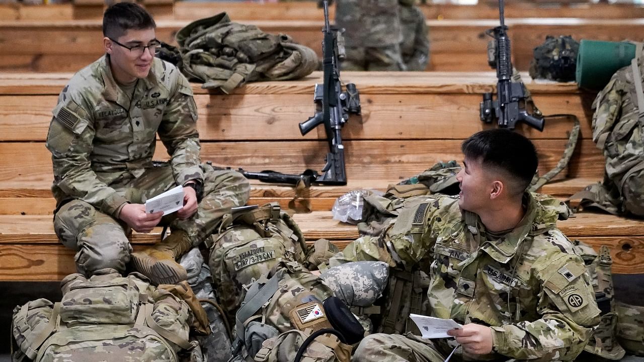 Soldiers from the 82nd Airborne Division wait to board a C-17 transport plane for deployment to Eastern Europe amid escalating tensions between Ukraine and Russia, at Fort Bragg, North Carolina. Credit: Reuters File Photo