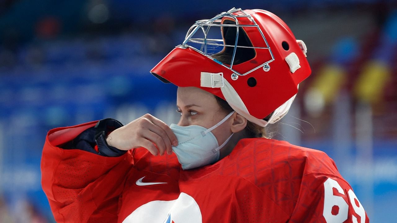 Mariia Sorokina of the Russian Olympic Committee wears a face mask during the match. Credit: Reuters Photo