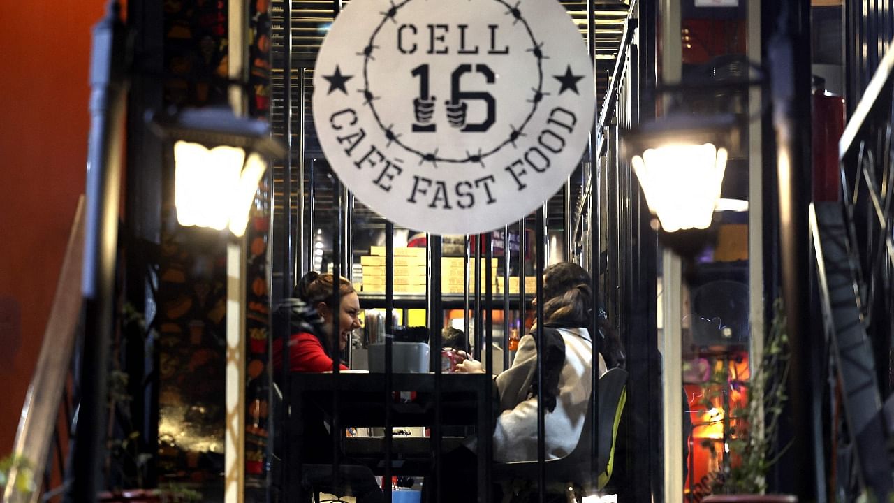 Iranians dine at restaurant-prison "Cell 16" in eastern Tehran. Credit: AFP Photo