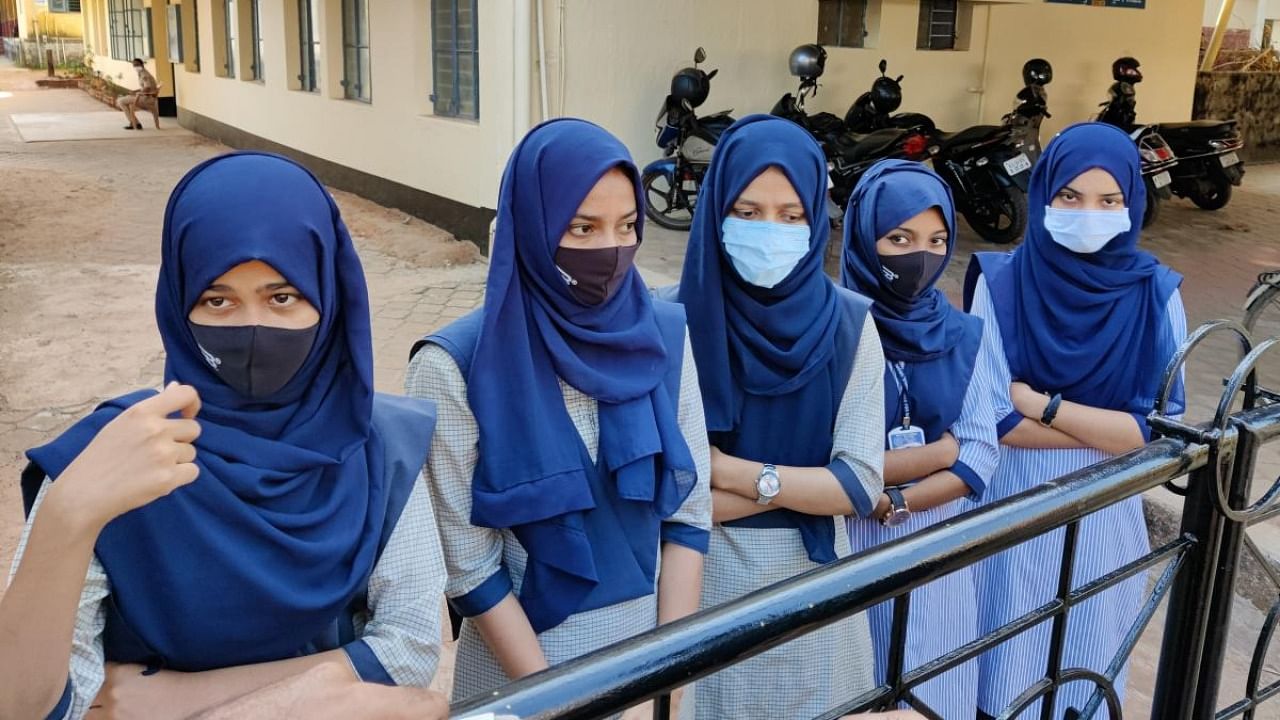 In the Udupi Government PU College, students continued wearing the hijab, even as the high court is expected hear a petition in this regard on Tuesday. Credit: DH File Photo