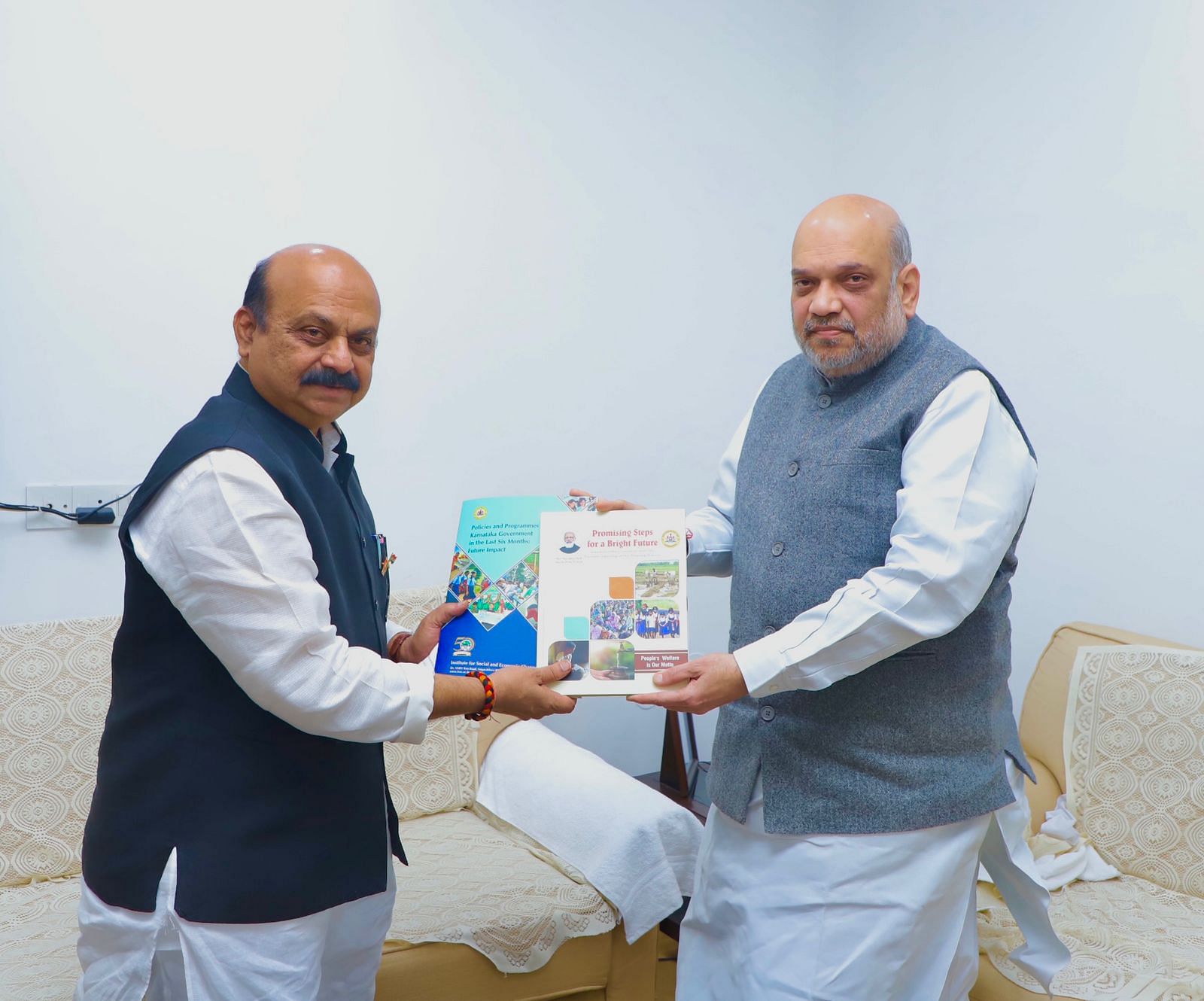 Bommai and Amit Shah. Credit: DH Photo