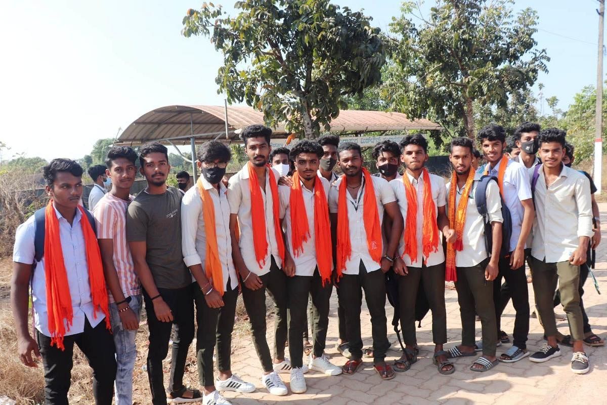 Students wear saffron shawls at Koteshwara First Grade College. 