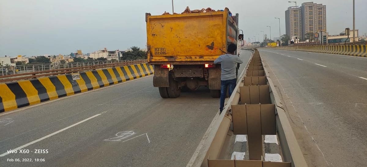 Officials conduct load testing on the Tumkur Road flyover at Peenya. Credit: DH Photo