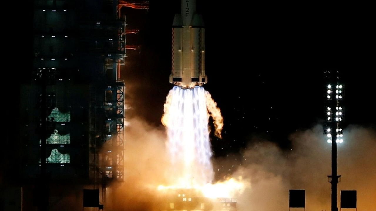 Launch of Long March-2F Y13 rocket near Jiuquan. Credit: Reuters Photo