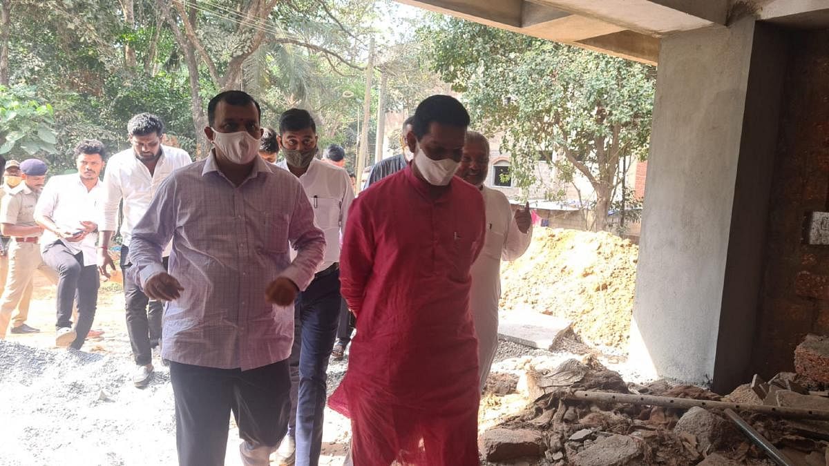 District In-charge Minister V Sunil Kumar inspects the ongoing works of the DC office complex in Padil. 