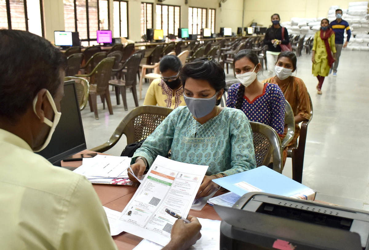 Students appear for document verification at UG NEET counselling at Karnataka Examinations Authority in Bengaluru on Friday. Credit: DH photo/B K Janardhan