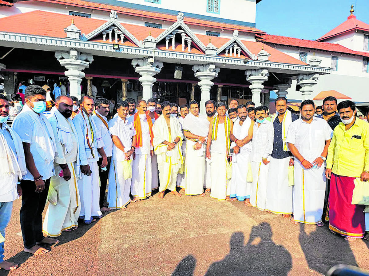 MLA Haratal Halappa in front of Shree Kshethra Dharmasthala.