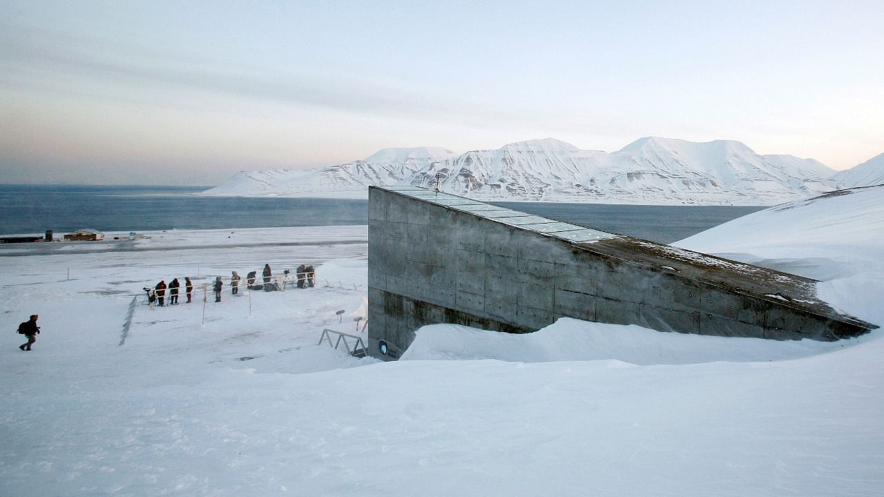 Television crews stand outside the Global Seed Vault before the opening ceremony in Longyearbyen. Credit: Reuters File Photo