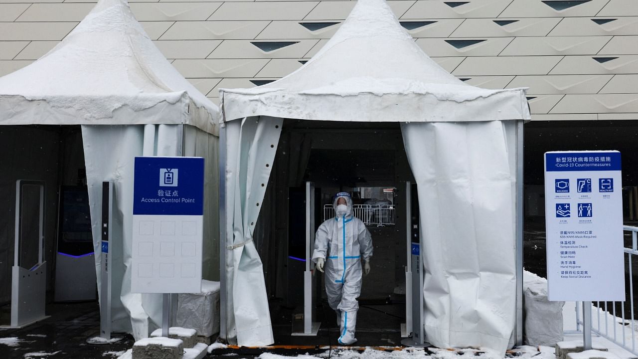 More than 50,000 Chinese workers have been hermetically sealed inside the Great Wall-like ring-fence of virus prevention. Credit: Reuters Photo