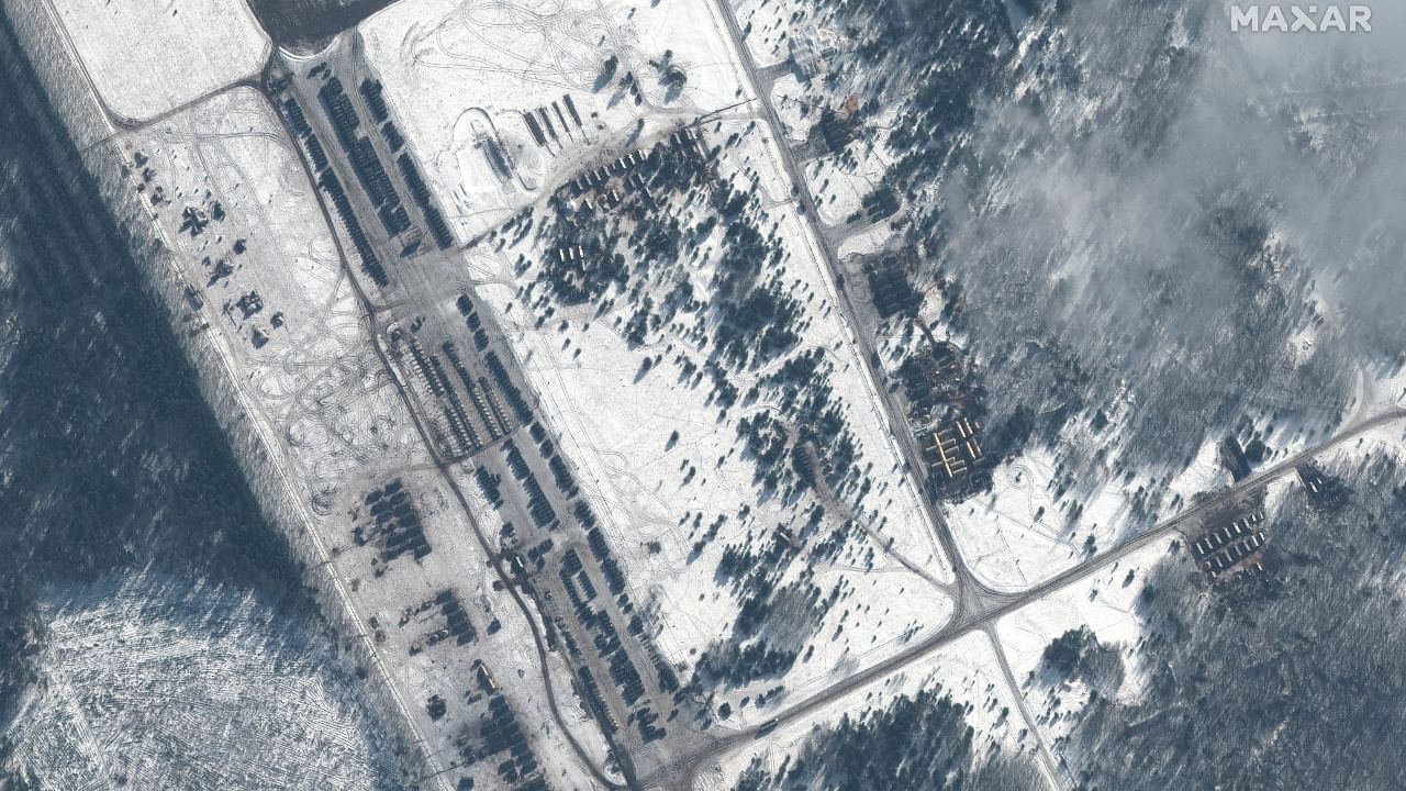 A satellite image shows troops and equipment deployments at Zyabrovka air base in Belarus. Credit: Reuters Photo