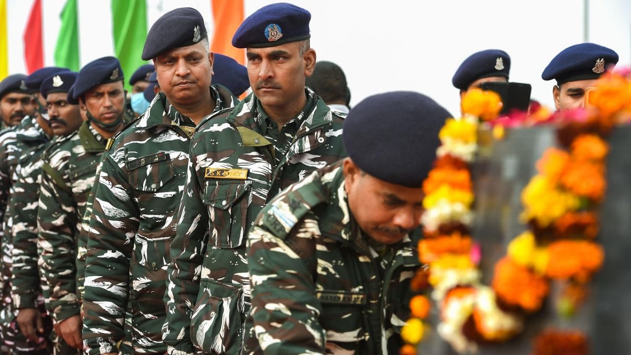 Central Reserve Police Force (CRPF) personnel pay tribute to those who were killed in the 2019 suicide bombing attack by militants in Pulwama, at a memorial in Lethpora. Credit: PTI Photo