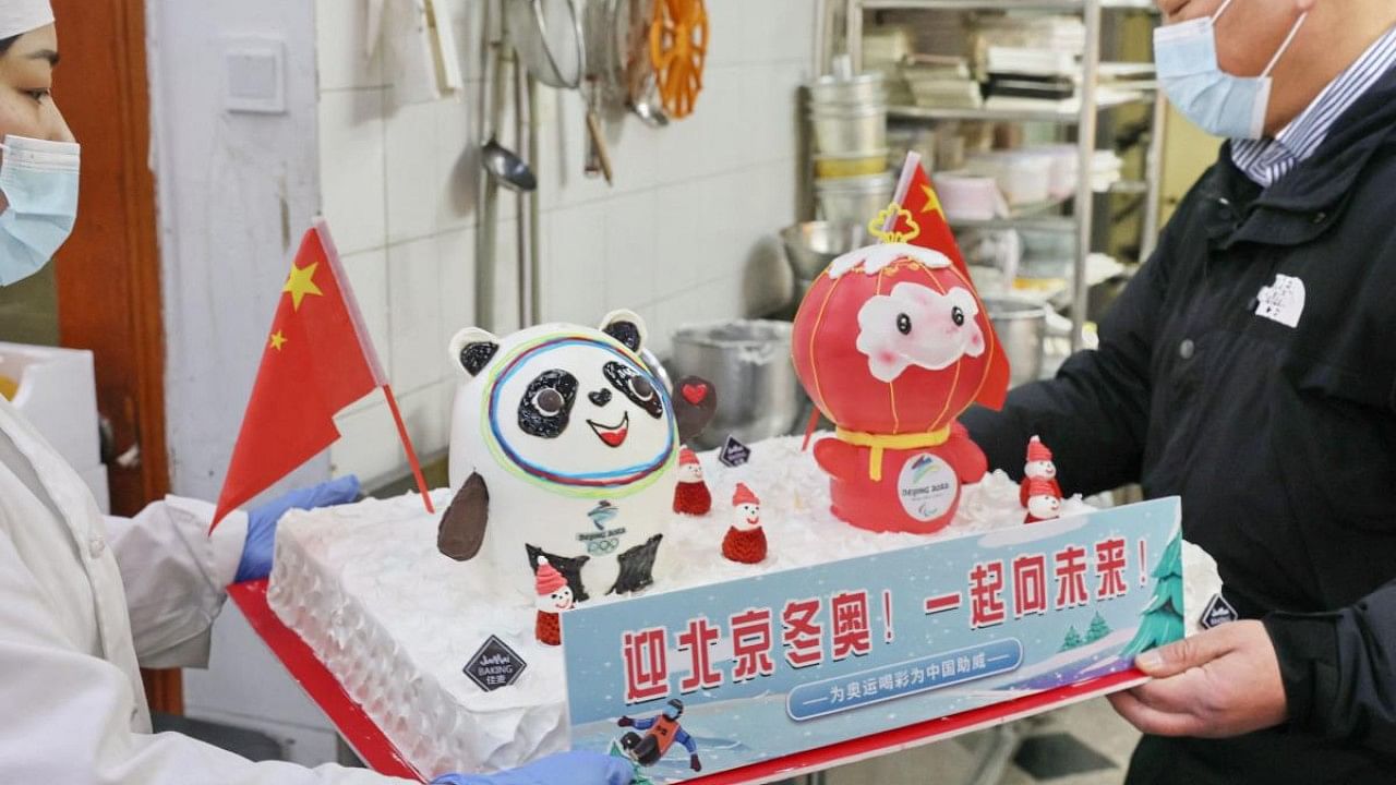 Cake with Bing Dwen Dwen (L) and Shuey Rhon Rhon, respective mascots of the 2022 Beijing Winter Olympic and Paralympic Games. Credit: AFP Photo